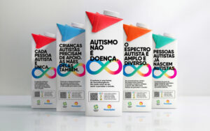 Campanha usa embalagens de leite para combater desinformação sobre autismo no Brasil